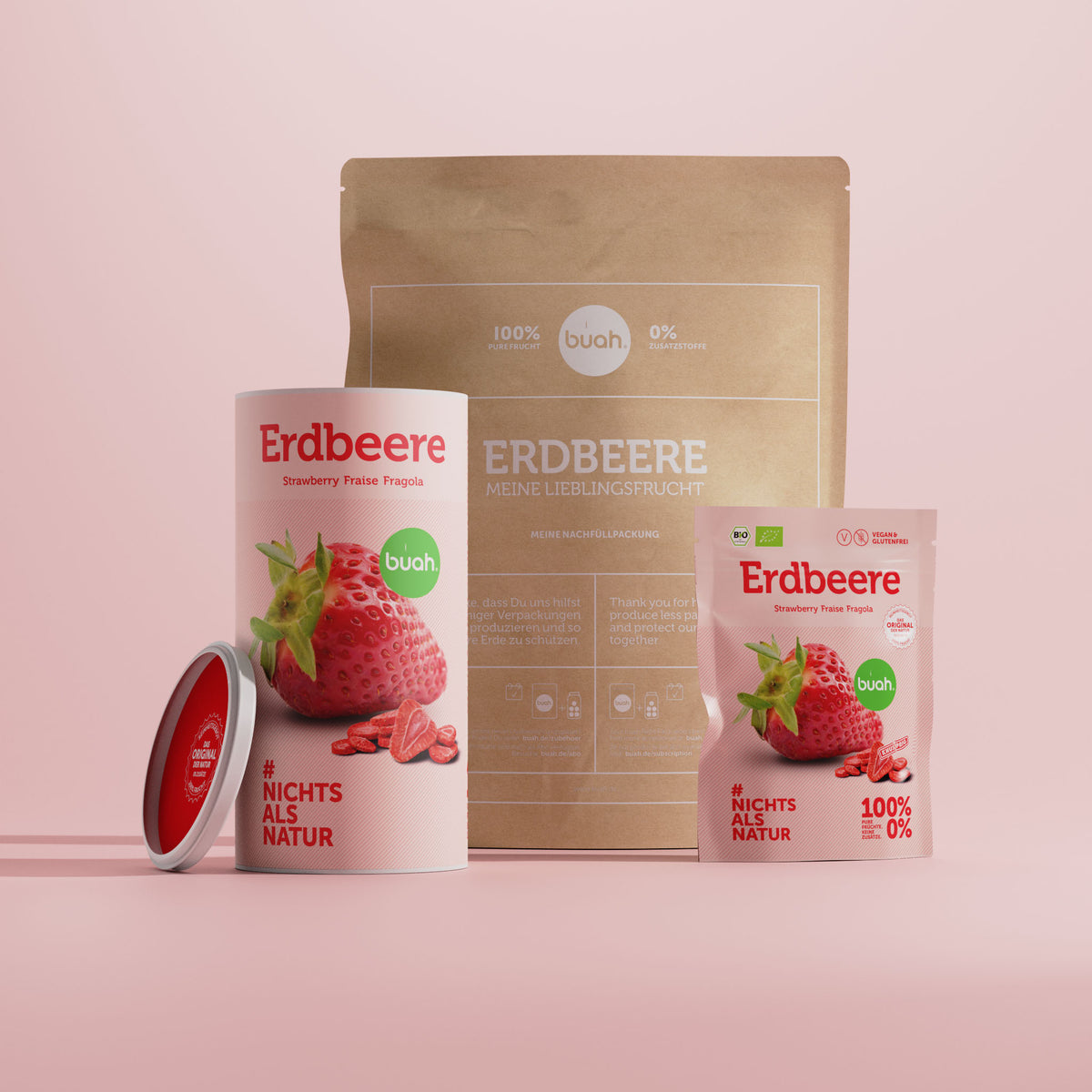 buah gefriergetrocknete Erdbeeren im Snackpack, der Dose und der Refill Packung nebeneinander